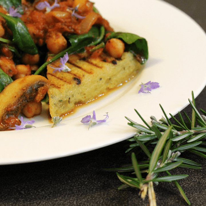 Olive and rosemary polenta with braised chickpeas.
