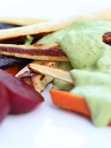 Green cashew sauce and roasted root vegetables.