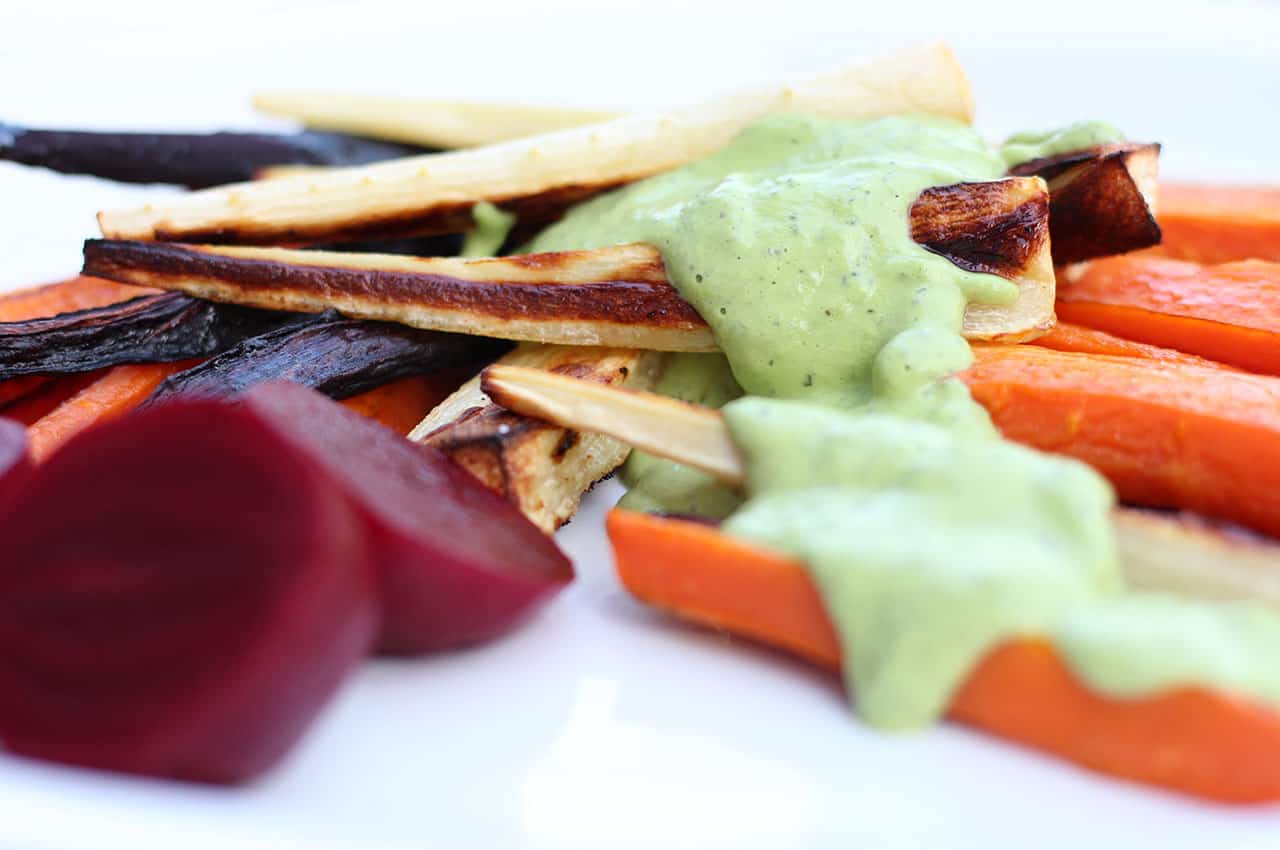 Green cashew sauce and roasted root vegetables.