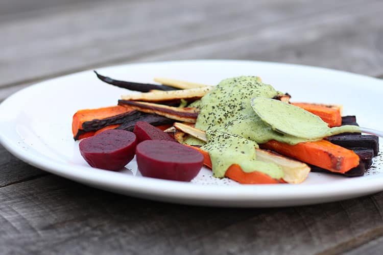 Roast vegetables with green cashew sauce. 