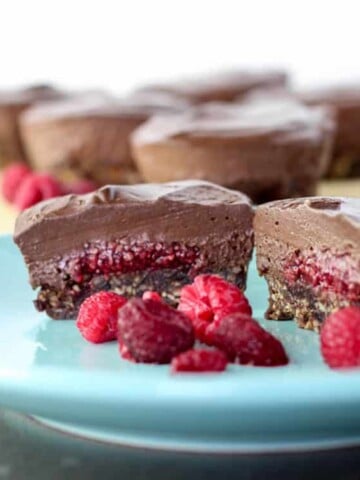 Mini chocolate and raspberry vegan cheesecakes.