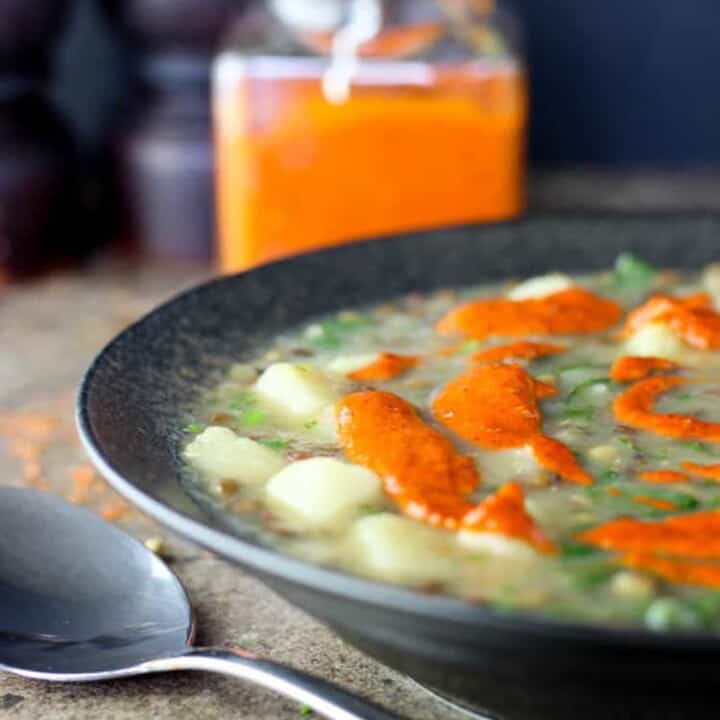 Green lentil soup with harissa.