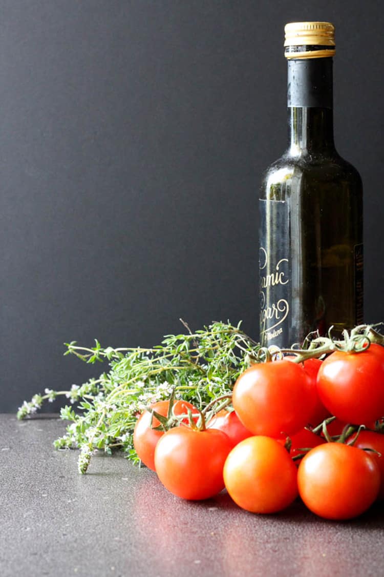 Balsamic vinegar, fresh thyme and tomatoes. 