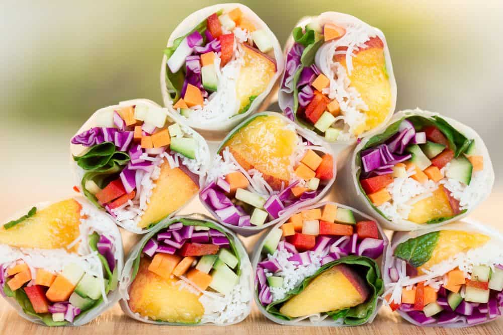 Peach summer rolls with peanut sauce. 