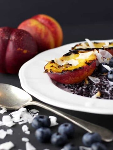 Black rice pudding with grilled nectarines.