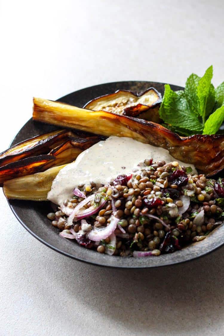 Eggplant and lentil salad with sumac tahini dressing. 