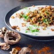 Cauliflower and walnut soup with a smoky crumb topping.