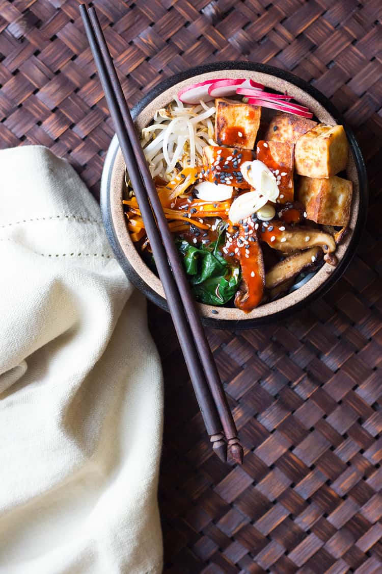Vegan bibimbap: sticky rice, sesame sauteed vegetables, crispy tofu and gochujang sauce. 
