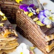 Vegan mille crepes cake (pancake cake layered with chocolate ganache) picture.