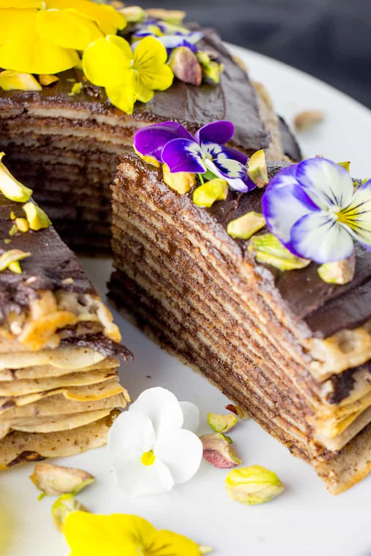 Vegan mille crepes cake (pancake cake layered with chocolate ganache) picture.