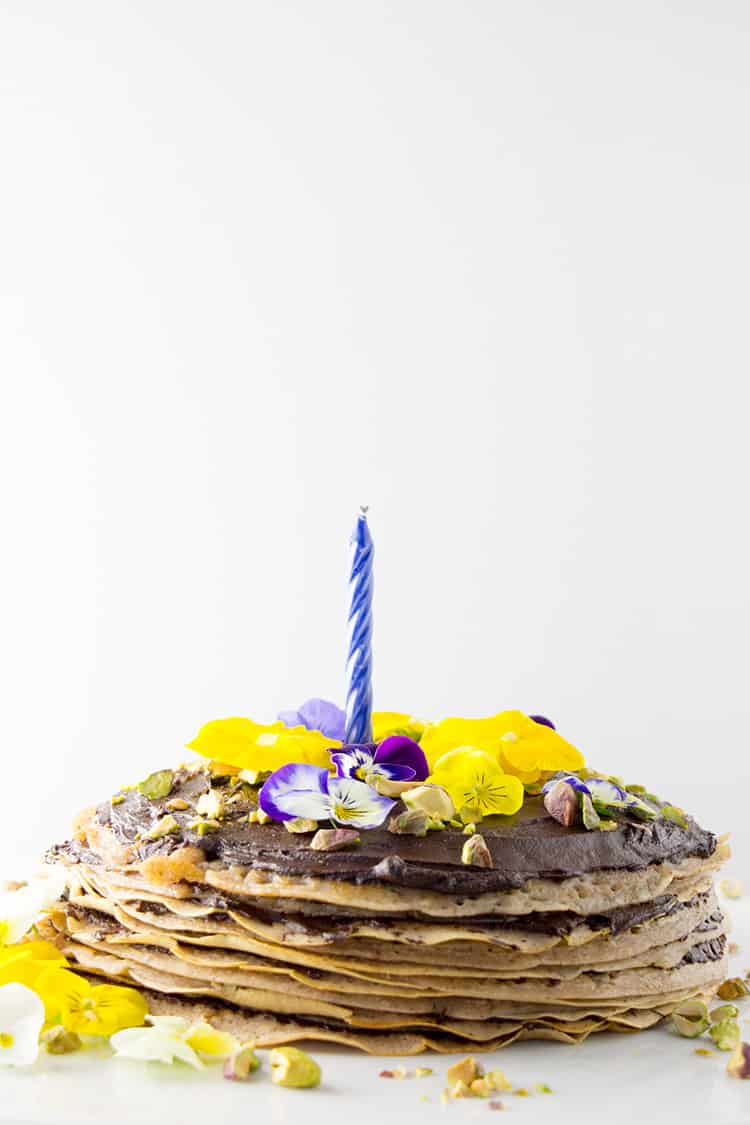 Vegan mille crepes cake (pancake cake layered with chocolate ganache) picture. 