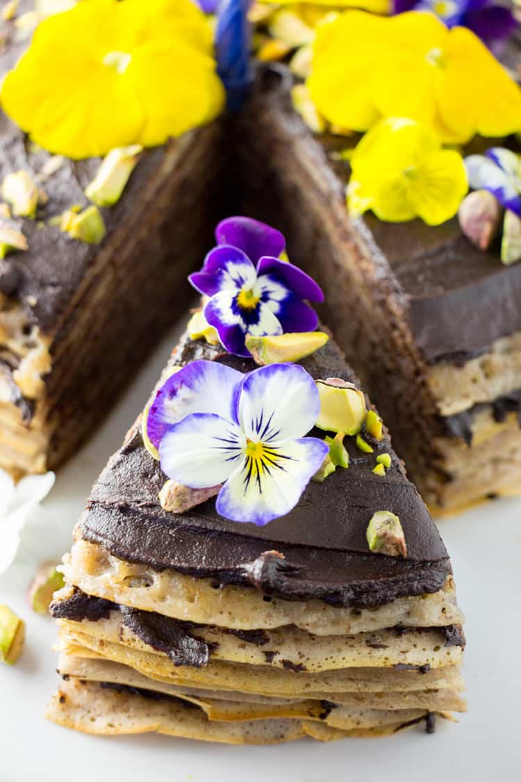 Vegan mille crepes cake (pancake cake layered with chocolate ganache) picture. 