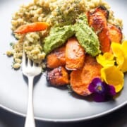 Vegan barley risotto with maple roasted carrots and kale pesto.