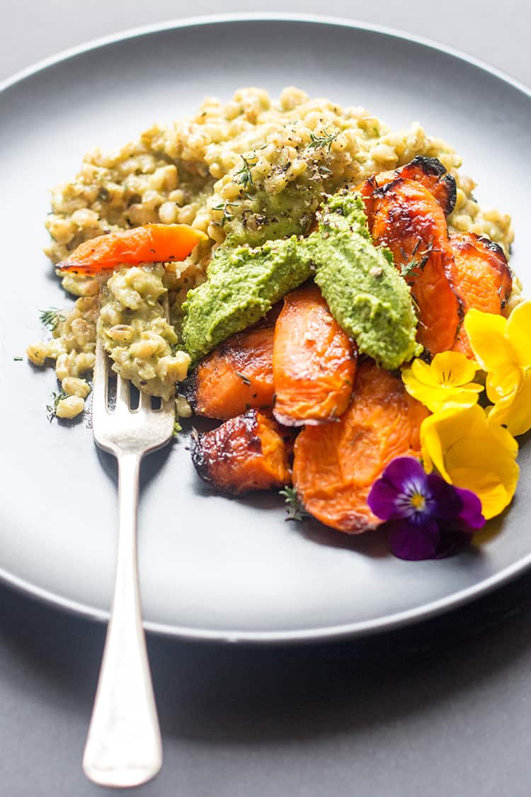 Vegan barley risotto with maple roasted carrots and kale pesto. 