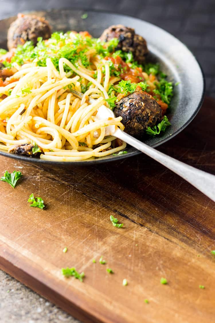 Vegan spaghetti and meatballs. Gluten free meatballs made with black beans, olives and sundried tomatoes.
