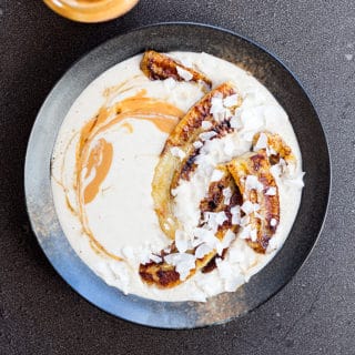 Raw buckwheat porridge with grilled bananas and peanut butter.
