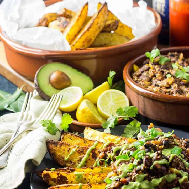 Cajun chili fries with avocado, lime and coriander sauce (vegan and gluten free).