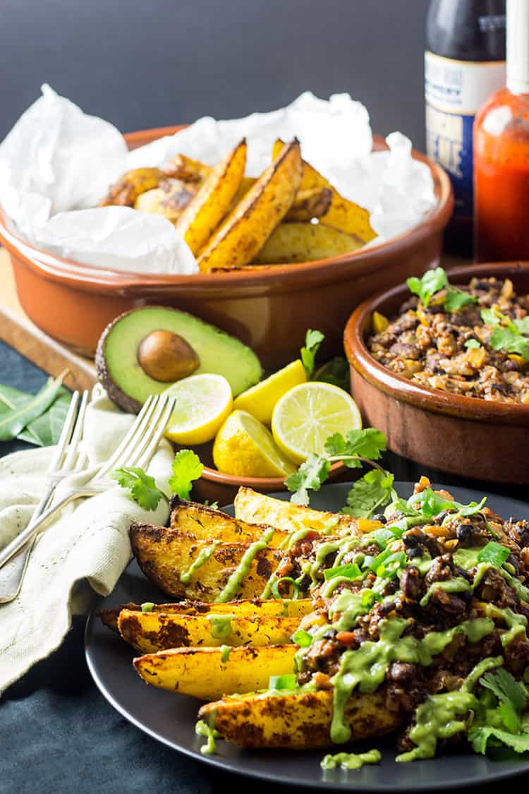 Cajun chili fries with avocado, lime and coriander sauce (vegan and gluten free).