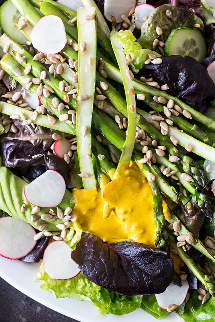 Asparagus salad with turmeric tahini dressing (vegan and gluten free). 