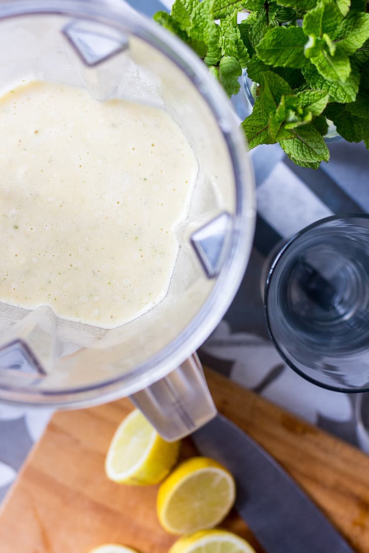 Pineapple and ginger rum cocktail, ingredients in the blender. 