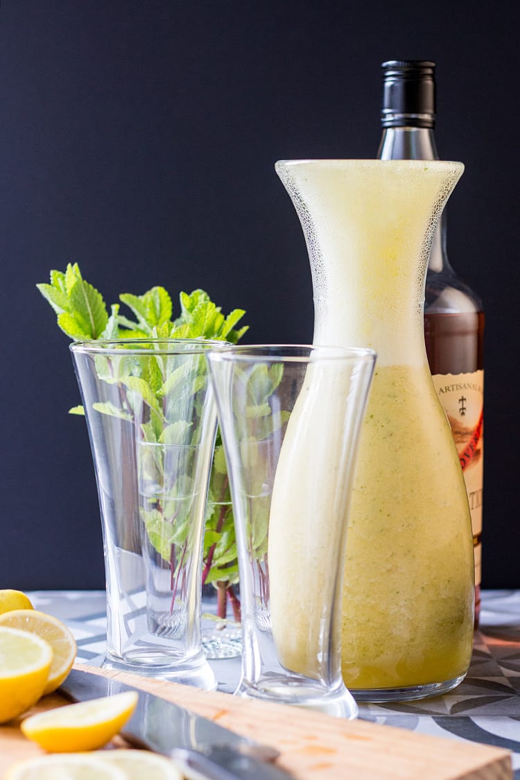 Pineapple and ginger rum cocktail with lime and mint (vegan and gluten free). 