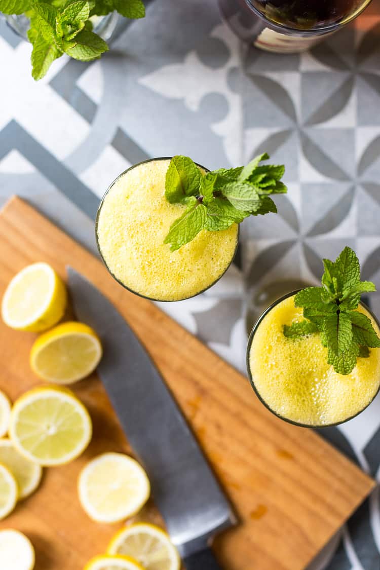 Pineapple and ginger rum cocktail with lime and mint (vegan and gluten free). 