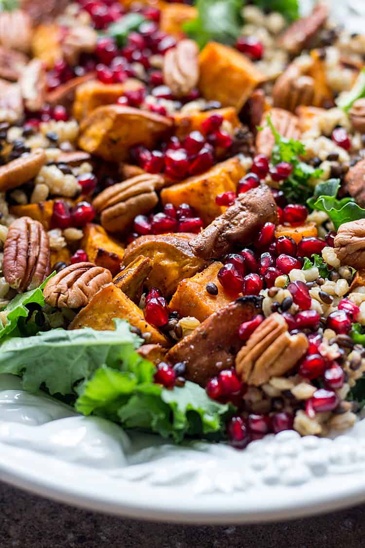 Sweet potato salad with pomegranate, pecans and barley (vegan).