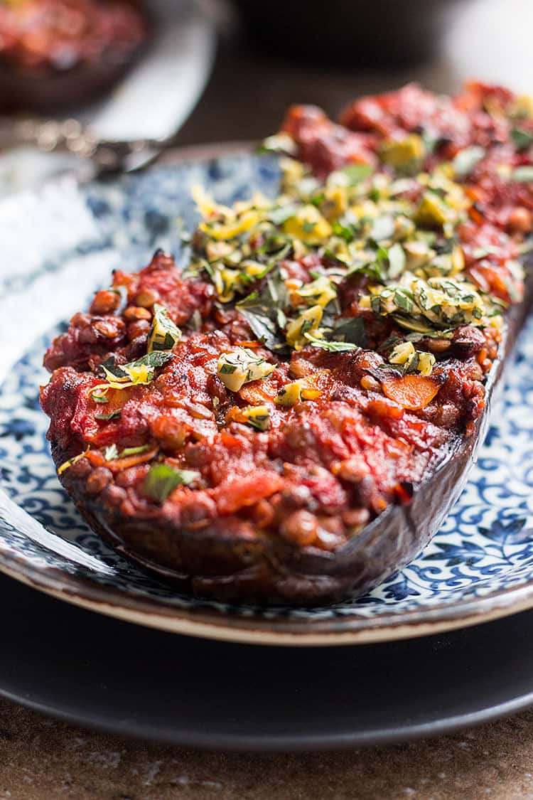 Baked eggplant with lentils, tomatoes and a herby topping (vegan, gluten free).