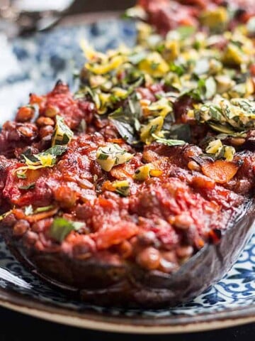 Baked eggplant with lentils, tomatoes and a herby topping (vegan, gluten free).