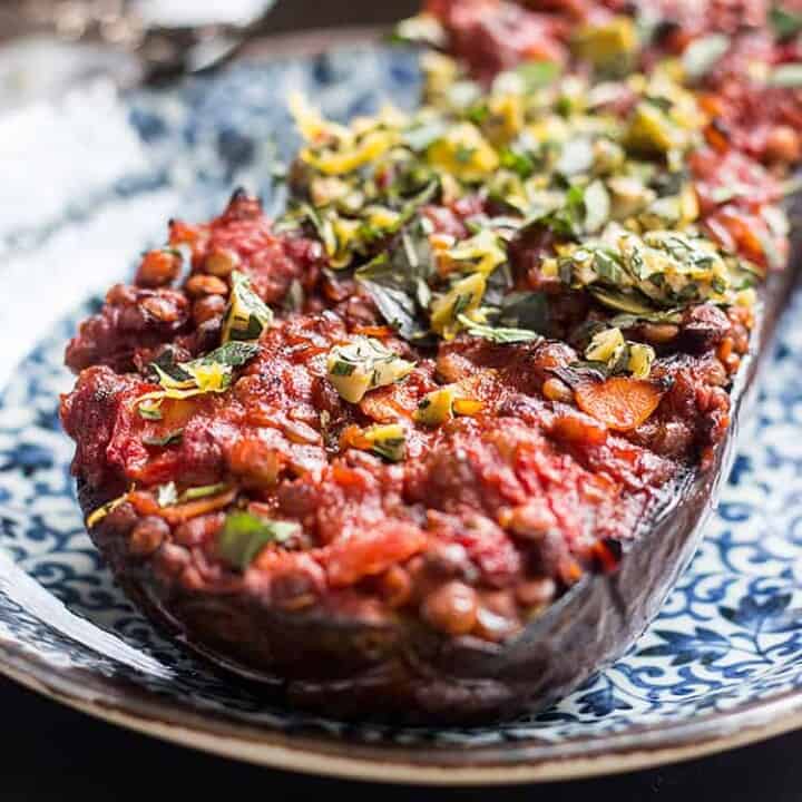 Baked eggplant with lentils, tomatoes and a herby topping (vegan, gluten free).