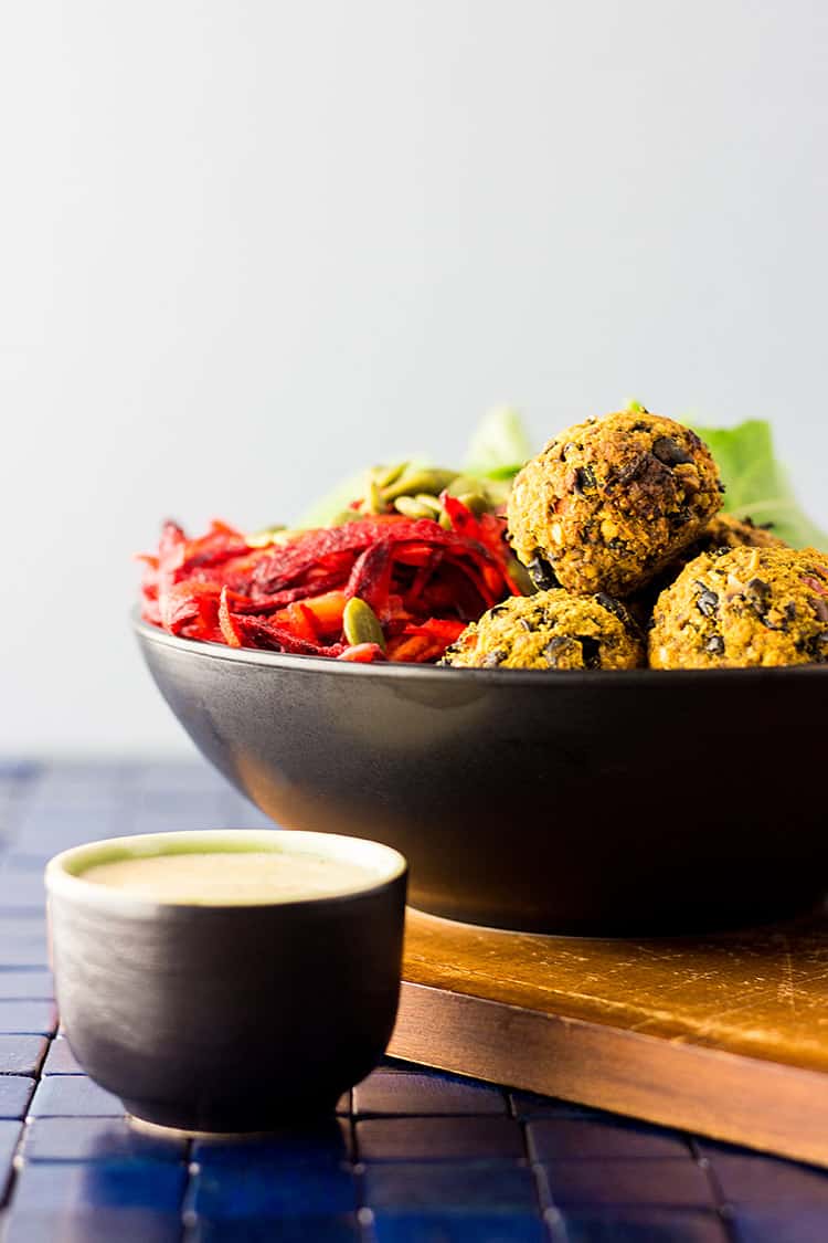 Vegan nourish bowl with beet salad and bean balls (gluten free). 