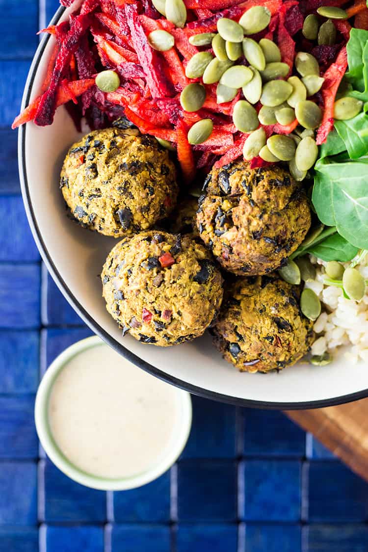 Vegan nourish bowl with beet salad and bean balls (gluten free).