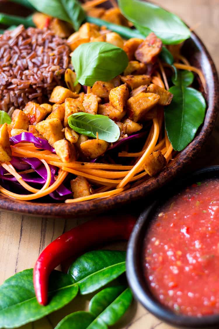 Bali bowl with tempeh, peanuts and tomato sambal (vegan and gluten free).