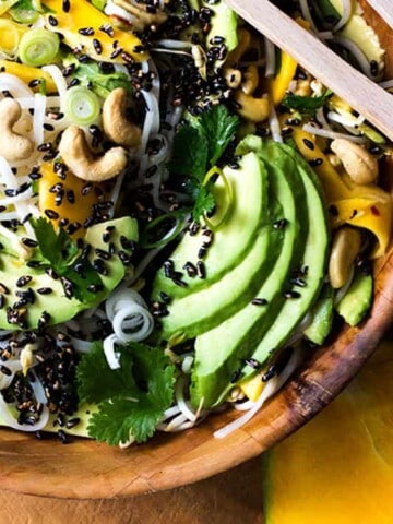 Mango and avocado noodle salad with puffed black rice (vegan and gluten free).