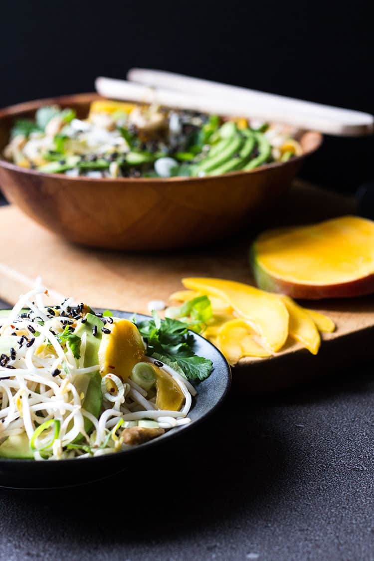 Mango and avocado noodle salad with puffed black rice (vegan and gluten free).