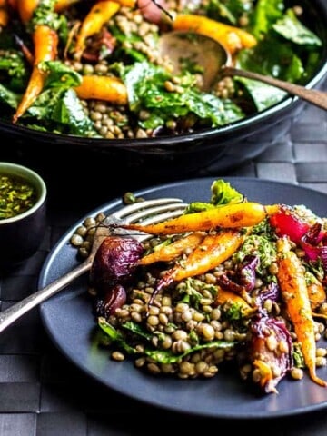 Lentil salad with roast baby carrots and red onions, dressed with chimichurri sauce (vegan and gluten free).