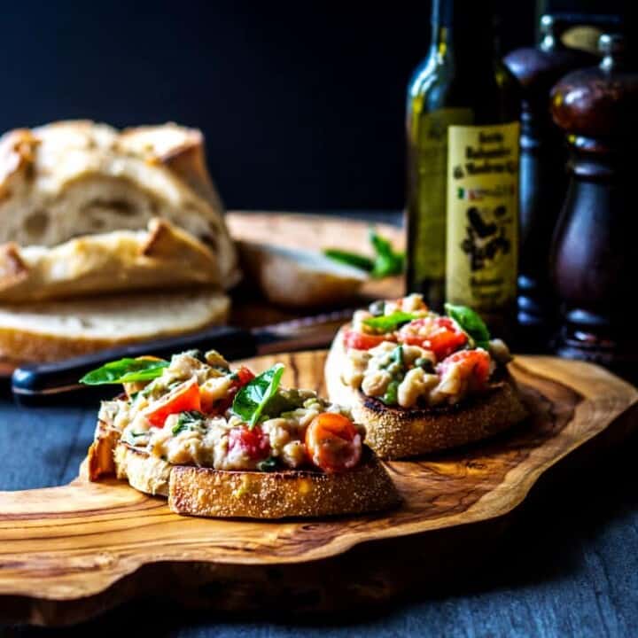 Cannellini bean and cherry tomato bruschetta (vegan).