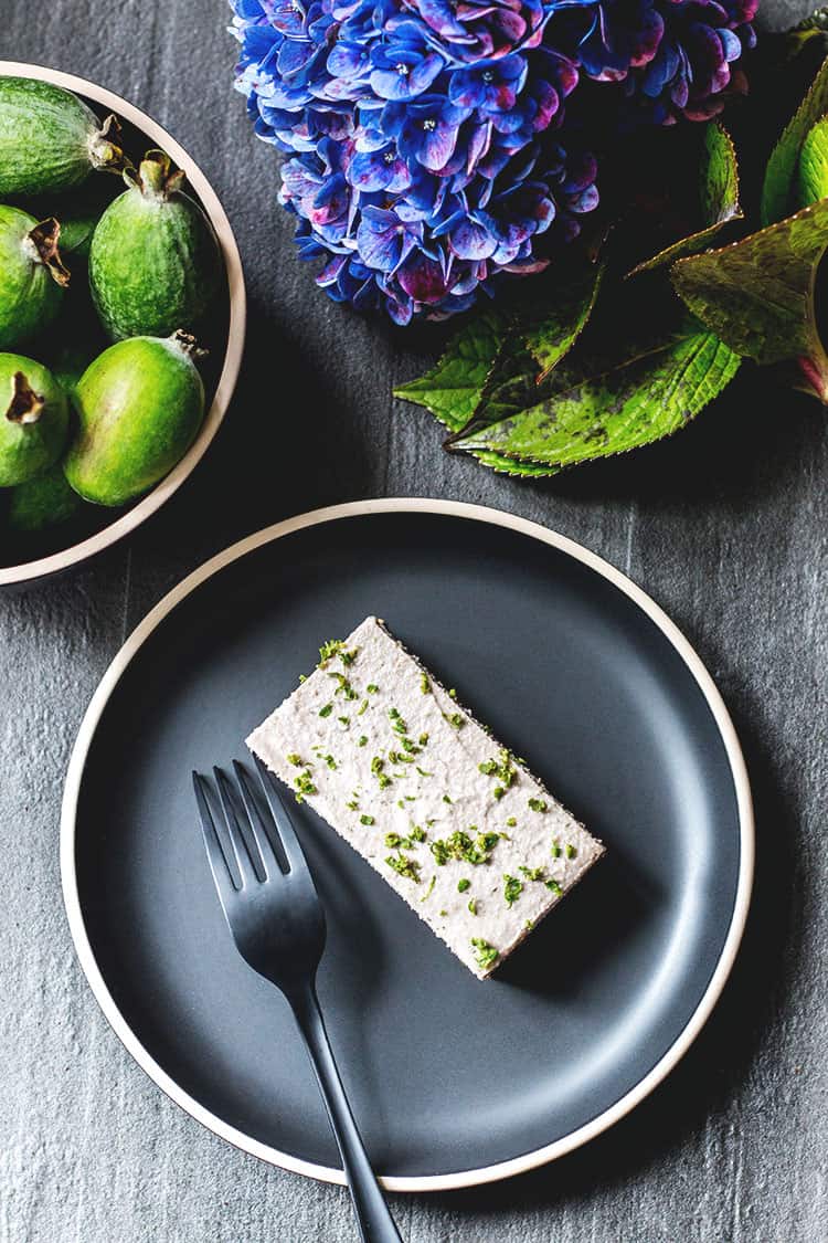 Feijoa and mint vegan cheesecake, pictured with a blue hydrangea from the garden. 