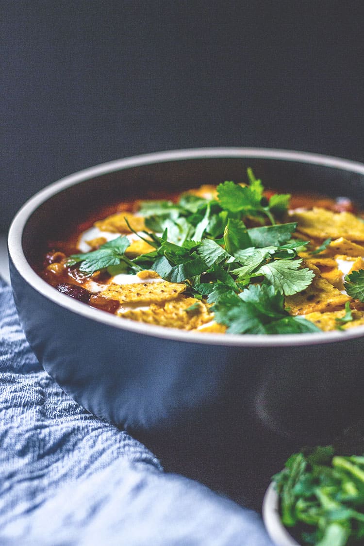 Black bean and corn nacho soup, topped with fresh coriander (cilantro). 