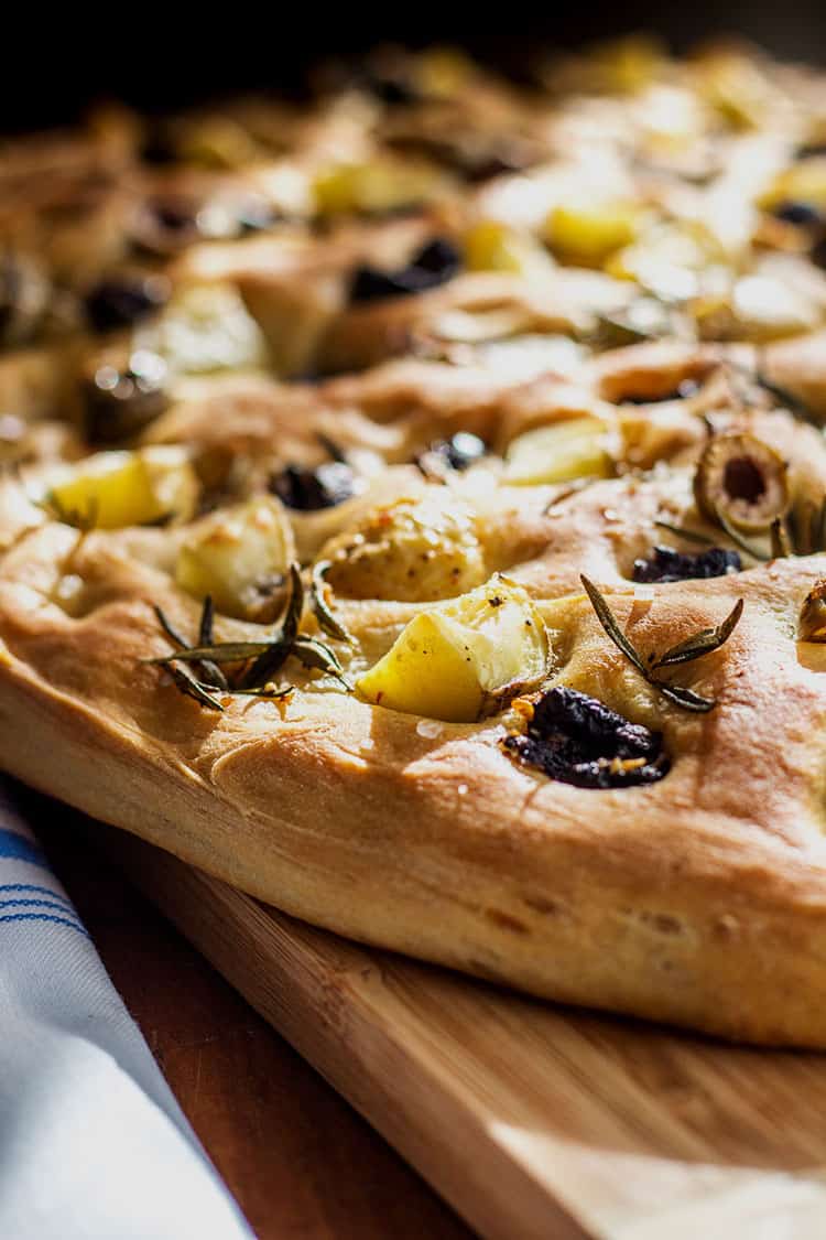 Potato foccacia with olives and rosemary (vegan). 