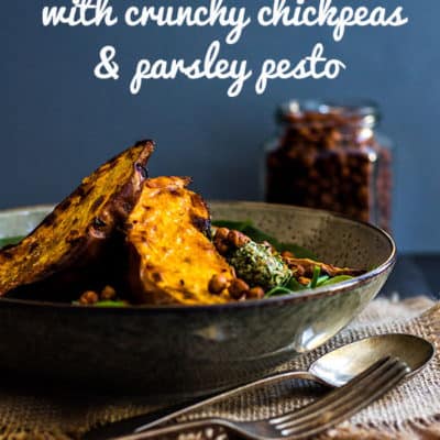 Tender baked sweet potato with crunchy paprika chickpeas and dollops of lemony parsley and walnut pesto make a delicious one bowl meal that's naturally vegan and gluten free.