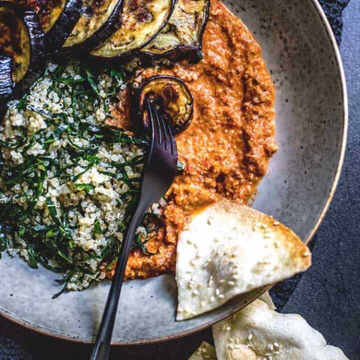 Quinoa, kale and eggplant bowl with muhammara dip (vegan and gluten free).