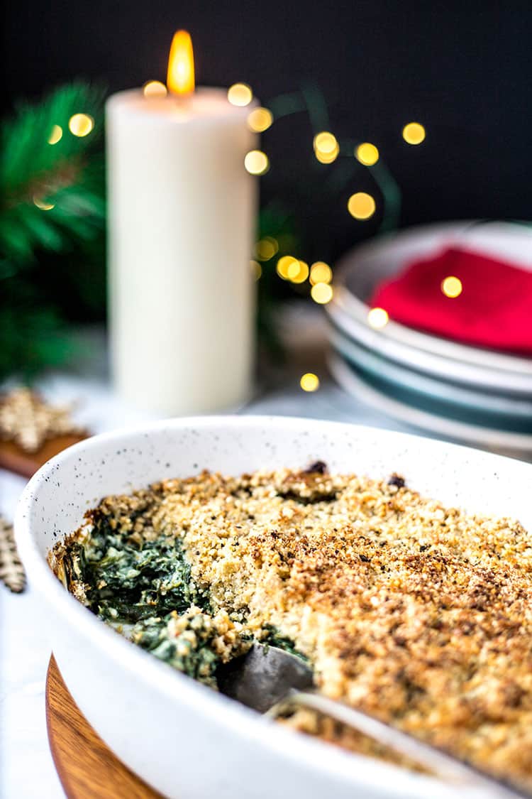 Vegan creamed spinach gratin with a seedy crumb topping. 