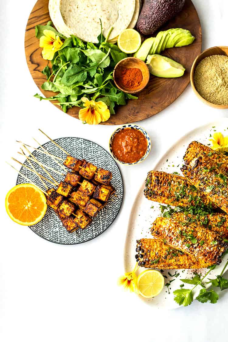 Orange chipotle tofu skewers, served with soft tacos, avocado and grilled Mexican sweet corn. 