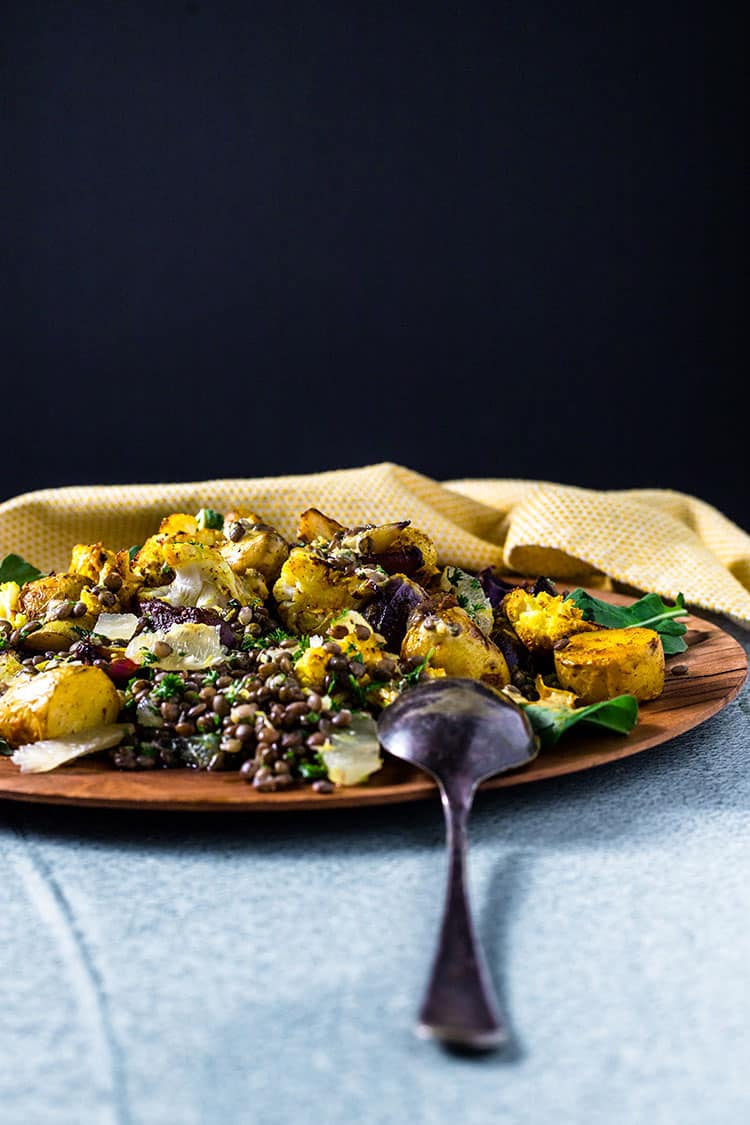 Potato, cauliflower and lentil salad on a serving platter.
