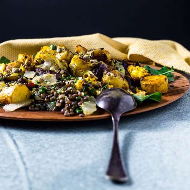 Potato, cauliflower and lentil salad with curry tahini dressing.