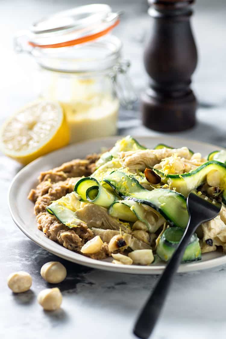 Zucchini, artichoke and macadamia salad with caramelised onion and bean puree. 