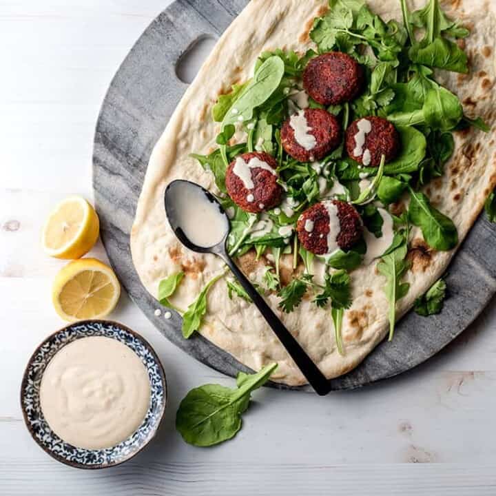 Beetroot falafel with tahini sauce.